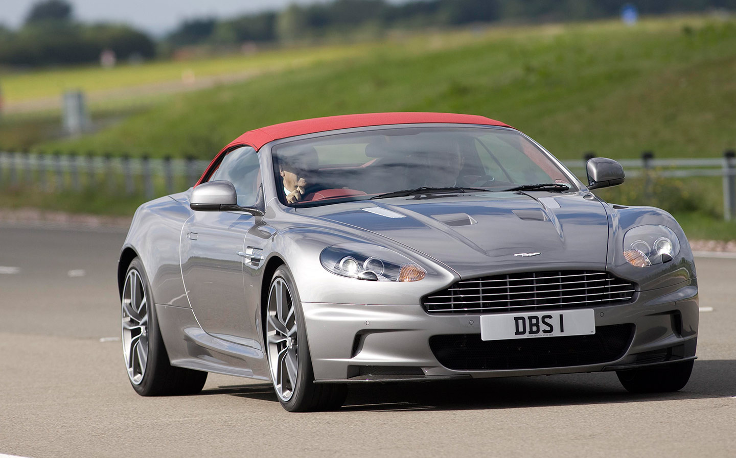 Vince Cable drives the 190mph Aston Martin Rapide S