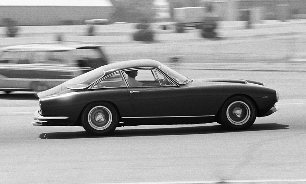 Steve McQueen driving his Ferrar 250 Gt Berlinetta Lusso