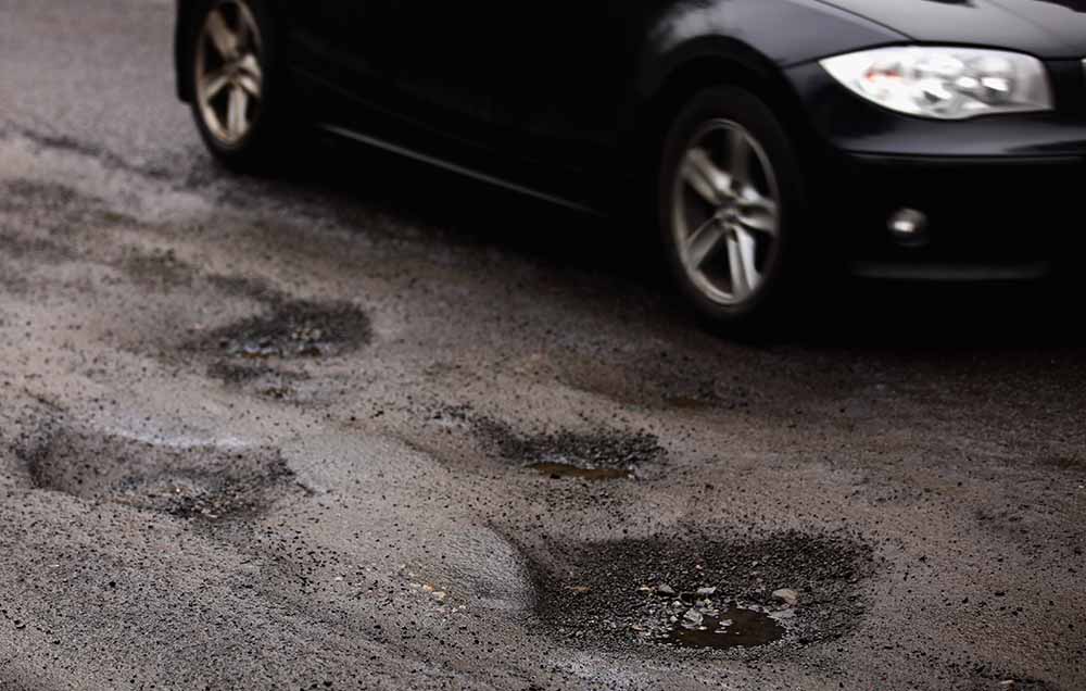 Potholes In The Roads Surrounding Glasgow