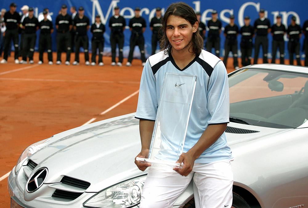 Rafael Nadal of Spain poses with his tro
