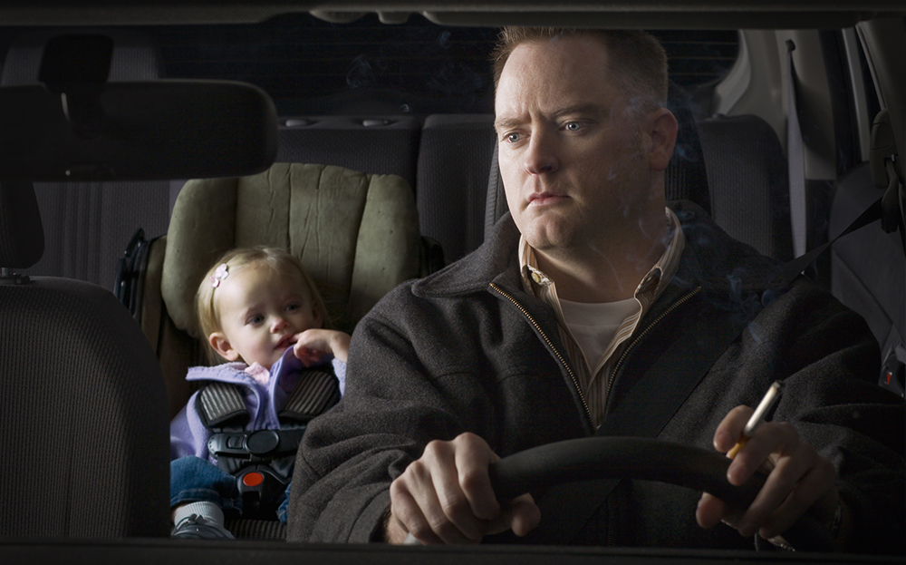 Smoking in a car with a child