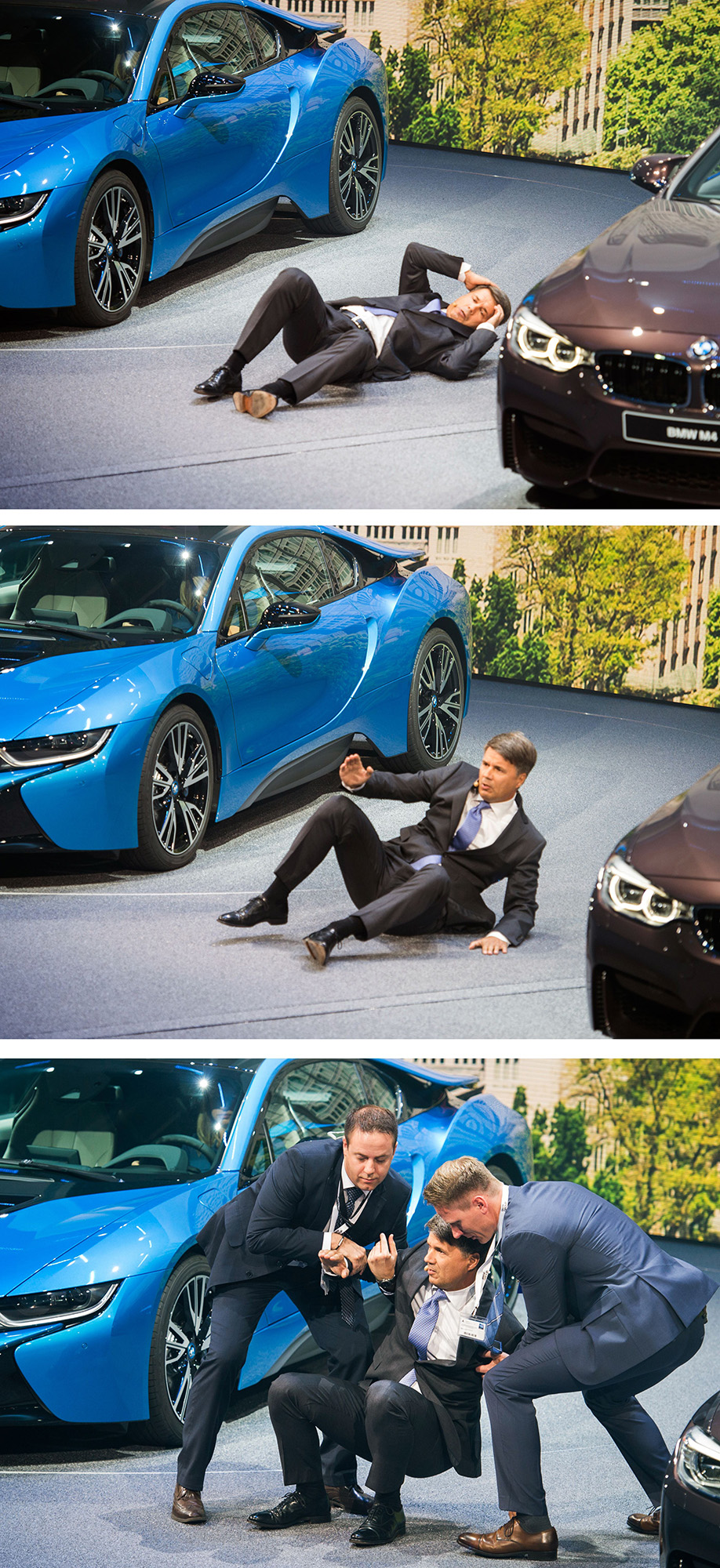 CEO of BMW Harald Krueger falls to the ground after fainting during a presentation at the 66th IAA auto show in Frankfurt on September 15, 2015. Hundreds of thousands of visitors are expected to crowd into the massive exhibition halls of Frankfurt's sprawling trade fair grounds later this week to catch a glimpse of the latest models and high tech innovations. AFP PHOTO / ODD ANDERSEN (Photo credit should read ODD ANDERSEN/AFP/Getty Images)