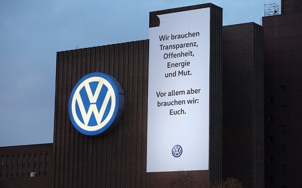 A sign at VW headquarters in Wolfsburg, Germany, that reads: "Wir brauchen Transparenz, Offenheit, Energie und Mut. Vor allen aber brauchen wir: Euch." We need transparency, openness, energy and courage. But above all we need you.)