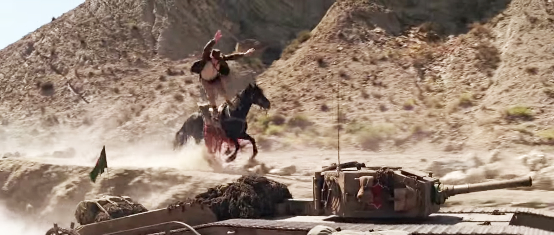Vic Armstong jumps from a horse onto a tank in Indiana Jones and the Last Crusade