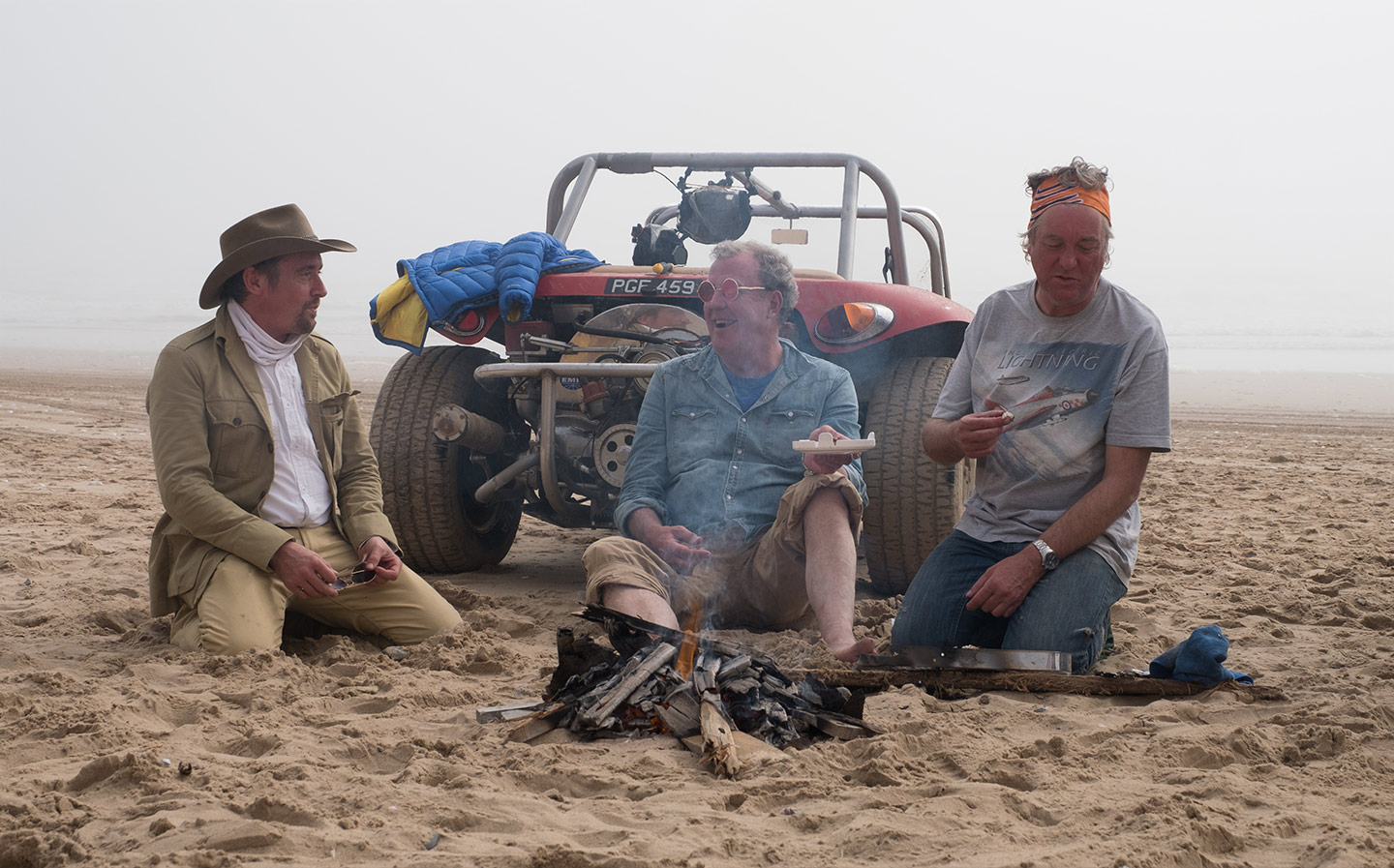 SANDWICHES IN THE SAND Hammond, Clarkson and May settle down for a snack in the Namib desert