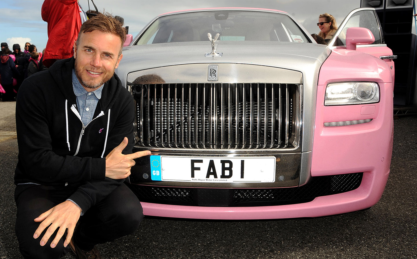 In the pink: Gary Barlow drove this Rolls-Royce Ghost for charity, but in real life he prefers something more frugal GETTY