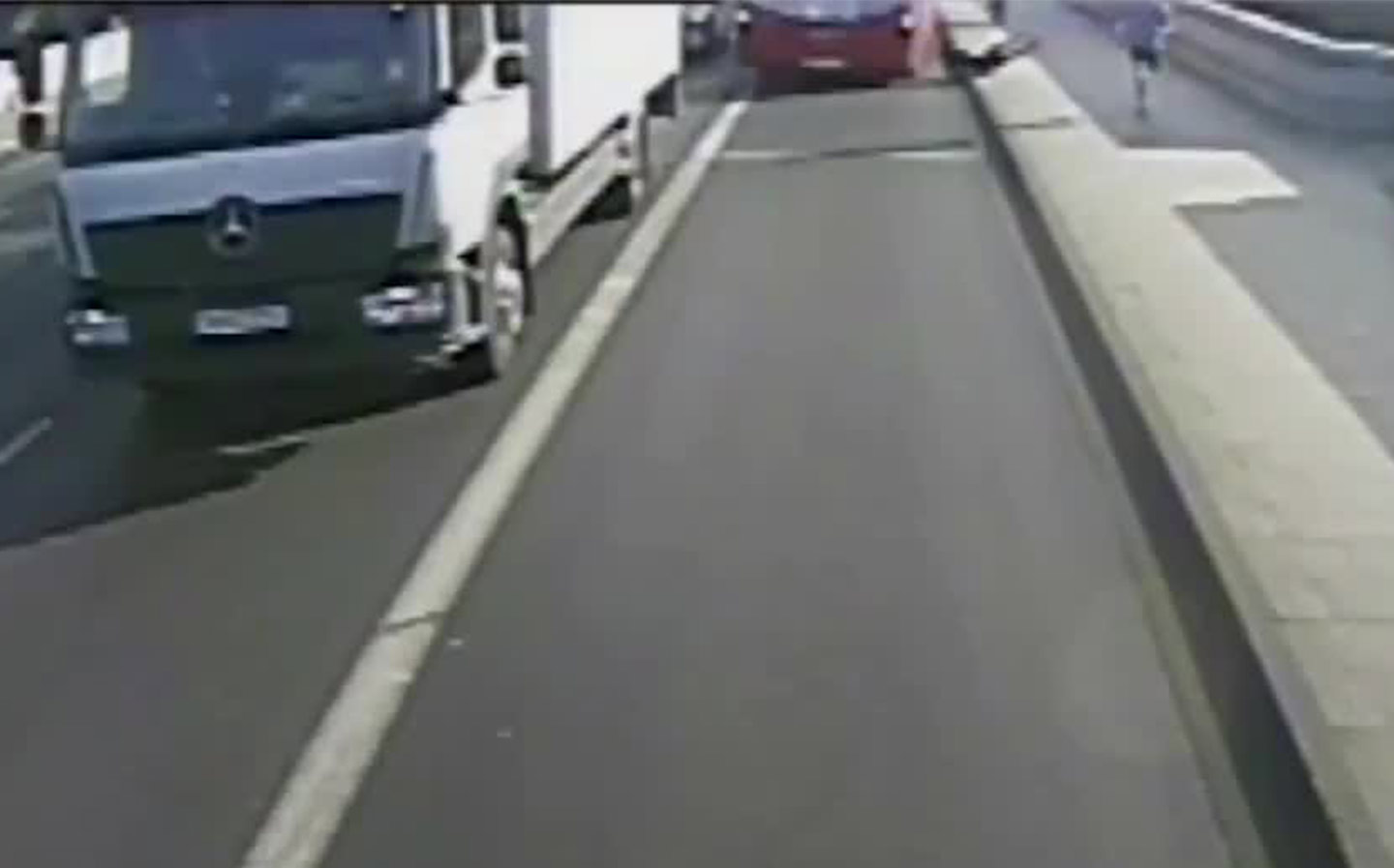 Video: Police search for jogger who 'knocked' woman into path of bus