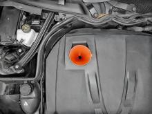 Changing engine oil: step-by-step guide; use a funnel when adding the new oil