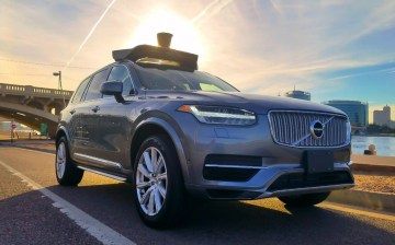 Pedestrian killed by Uber self-driving car in America; company suspends tests
