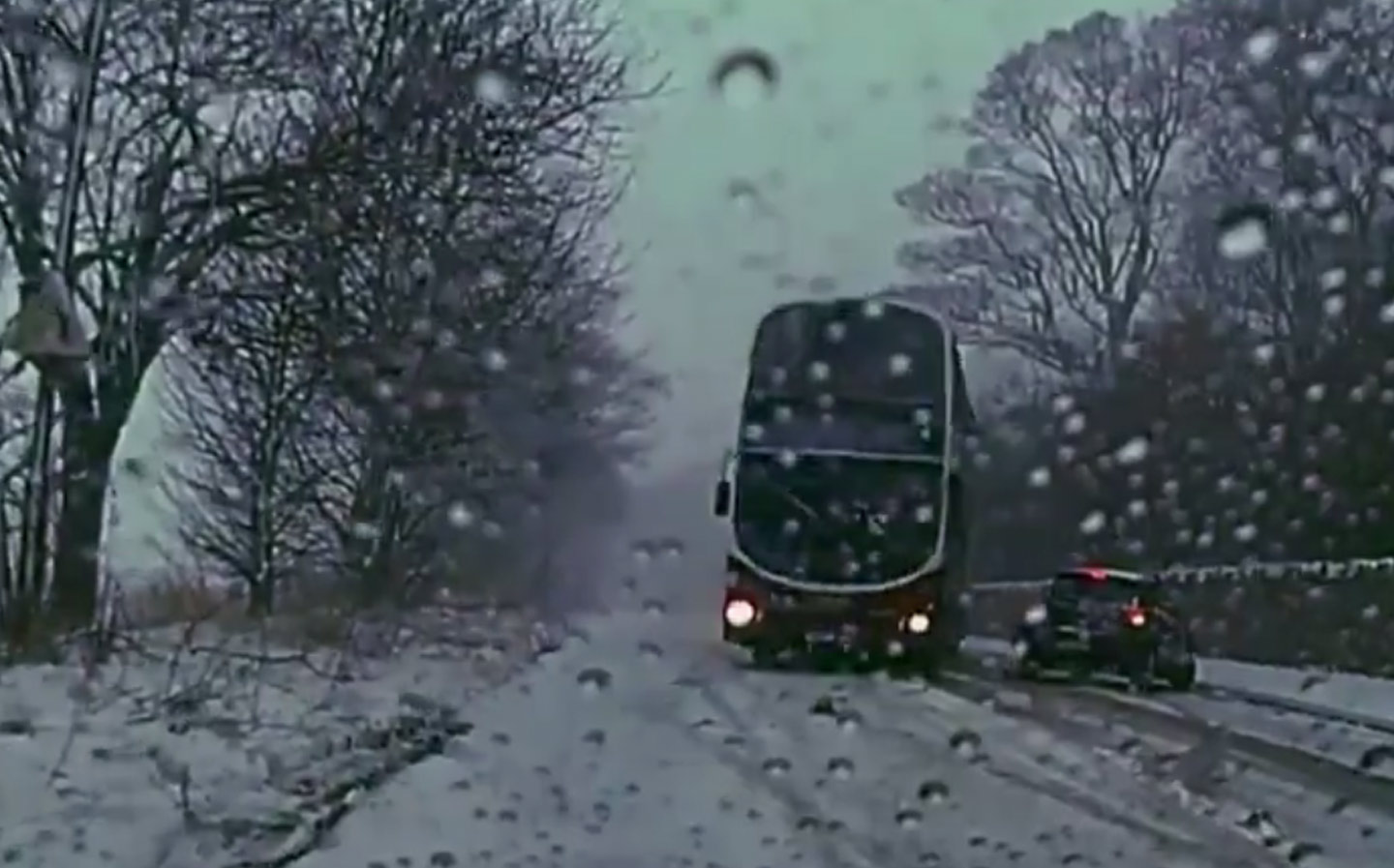 Hero bus driver narrowly avoids car in snow as The Beast from the East and Storm Emma cause chaos on British roads