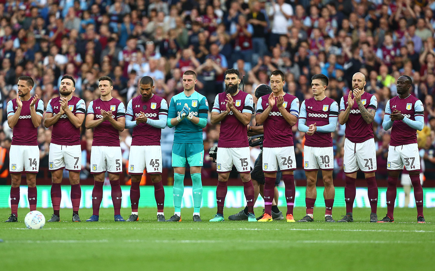 Aston Villa players took part in a minute's applause in remembrance of Jlloyd Samuel at Villa Park yesterday