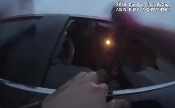 Dramatic bodycam footage shows police saving driver from drowning after lake crash