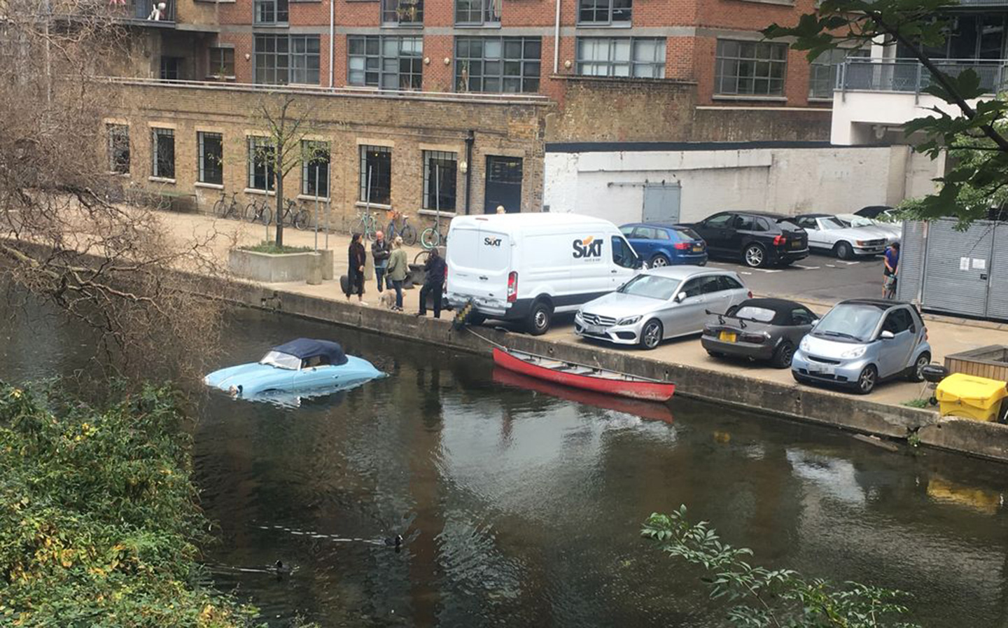 Porsche Speedster shunted into canal by van driver