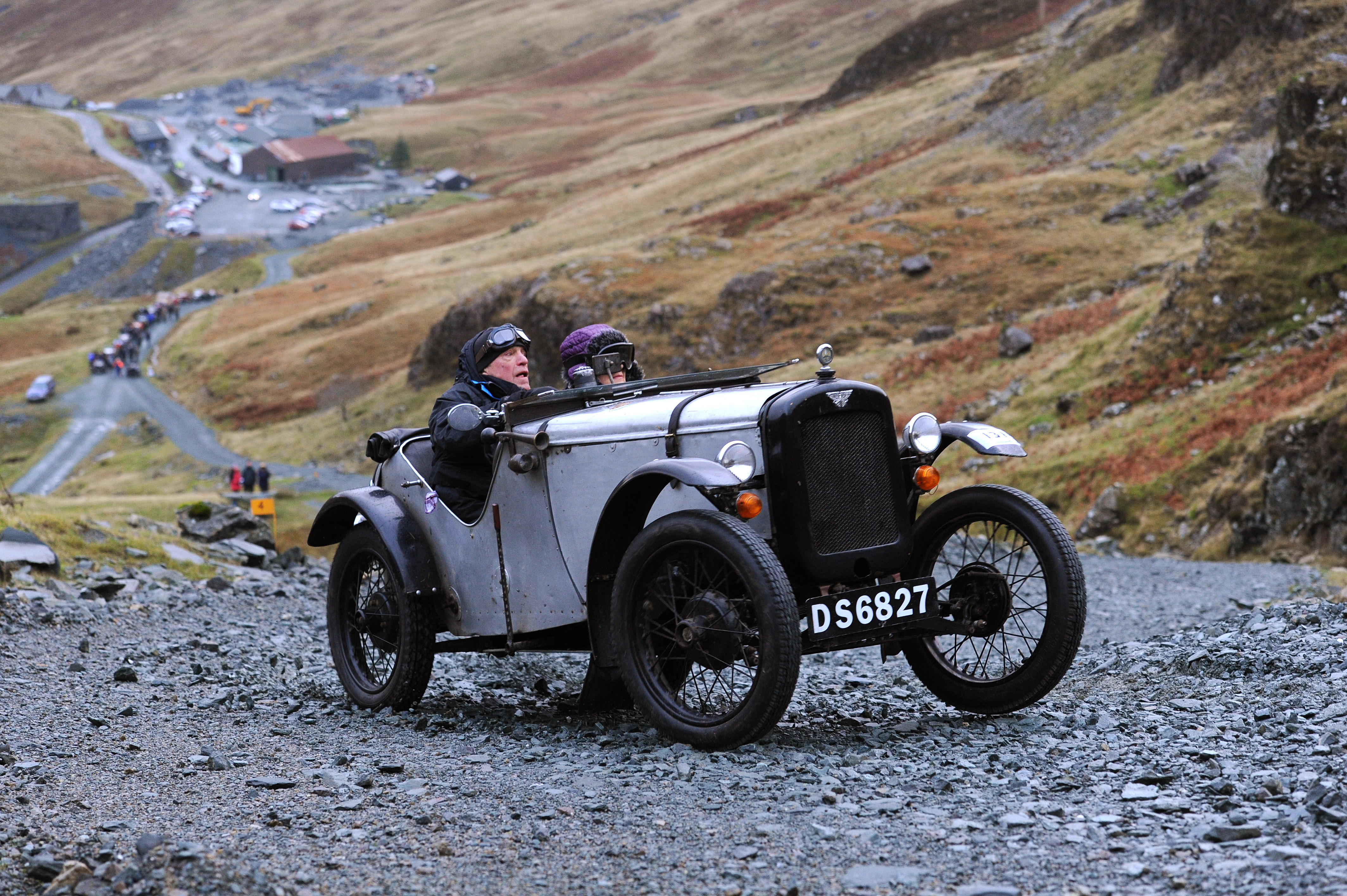 KESWICK, UNITED KINGDOM - NOVEMBER 08: Terry Gosling drives his Austin 7 Sports Ulster Rep during a vintage car rally stage at the Honister Slate Mine on November 8, 2014 in the Lake District, England. The event, part of the Lakeland Trials, is held annually by the Vintage Sports Car Club and challenges drivers and their machines through hairpin bends and rocky terrain against a backdrop of awe-inspiring scenery. (Photo by Anna Gowthorpe/Getty Images)