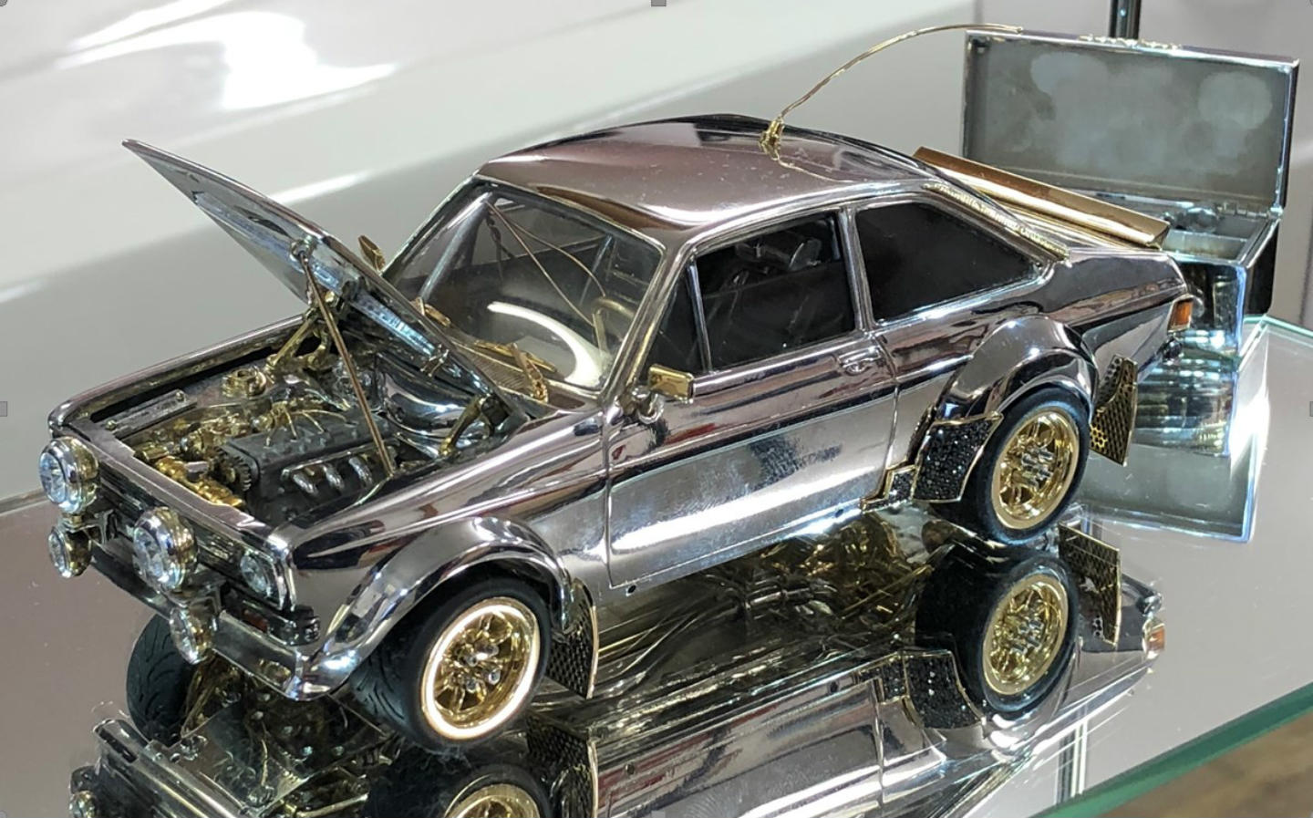 Bejewelled Ford Escort rally car model heading to charity auction
