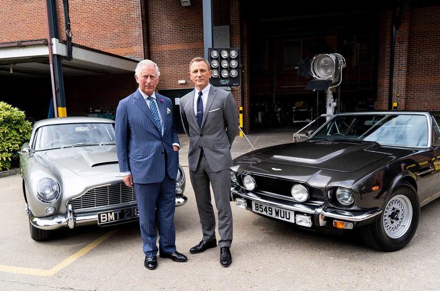 Britain's Prince Charles, Prince of Wales poses with British actor Daniel Craig as he tours the set of the 25th James Bond Film at Pinewood Studios in Iver Heath, west of London, on June 20, 2019. - The Prince of Wales, Patron, The British Film Institute and Royal Patron, the Intelligence Services toured the set of the 25th James Bond Film to celebrate the contribution the franchise has made to the British film industry. (Photo by Niklas HALLE'N / POOL / AFP)        (Photo credit should read NIKLAS HALLE'N/AFP/Getty Images)
