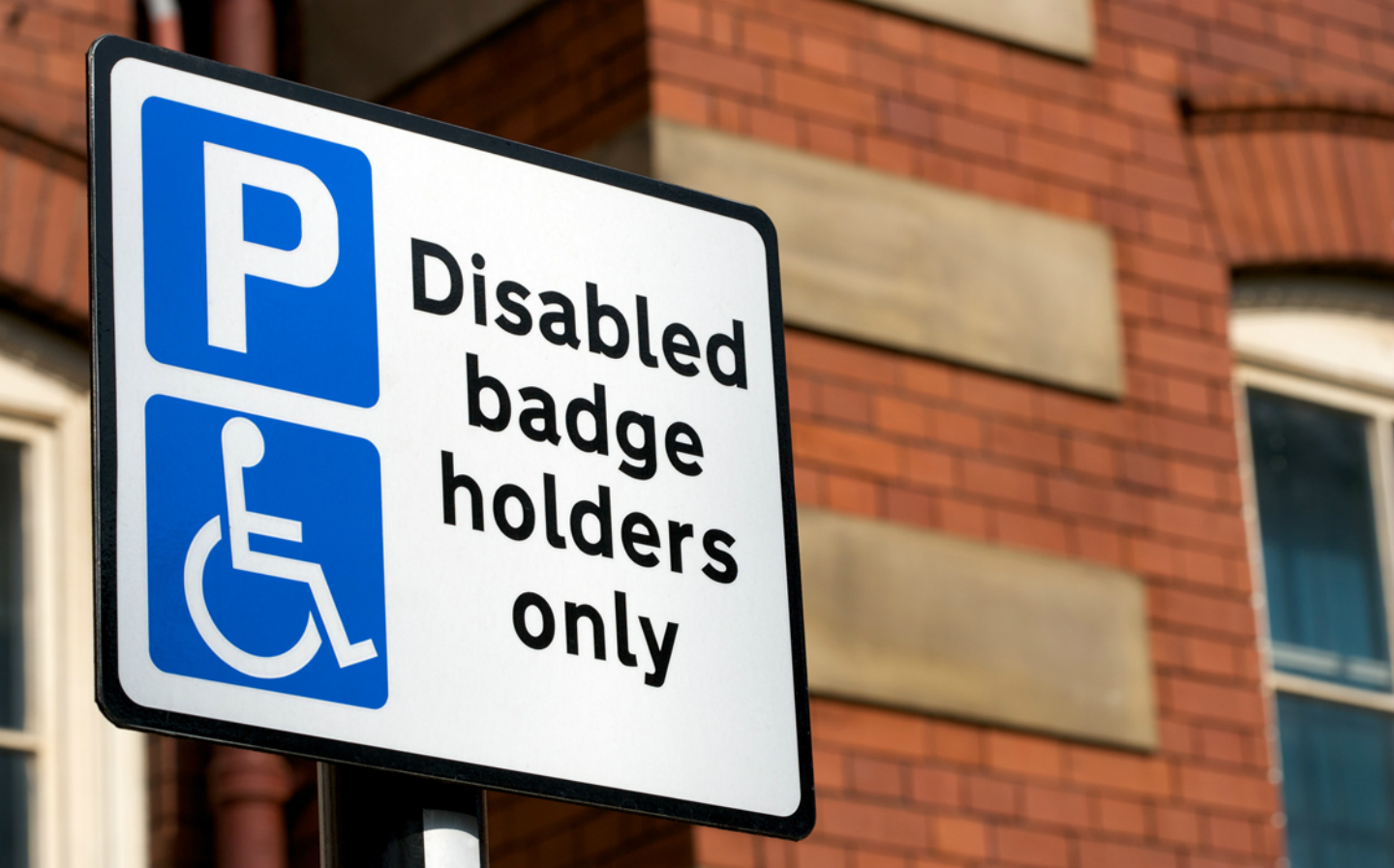 Disabled Blue Badge holders only parking sign