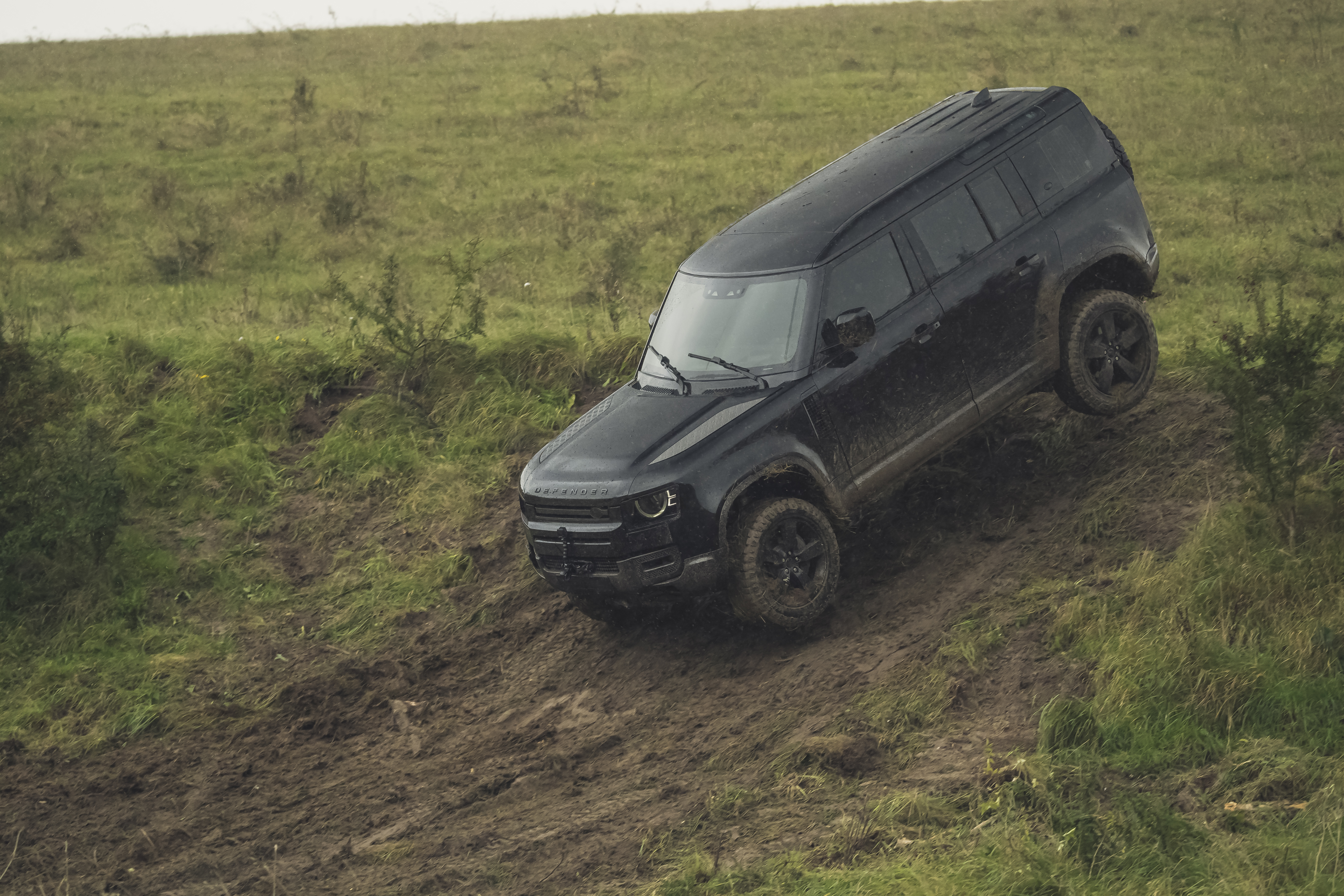 Behind the scenes image of the New Land Rover Defender featured in No Time To Die
