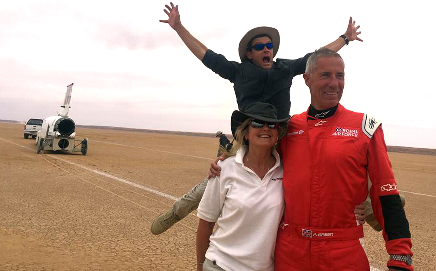 Andy and Emma Green and Stu Edmondson celebrate a successful 461mph run