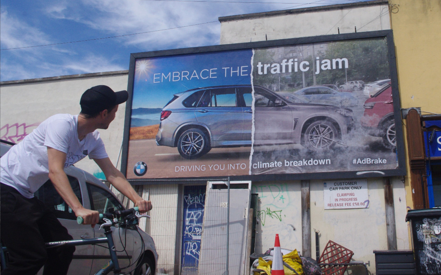 Environmental activists install anti-car billboards across UK cities