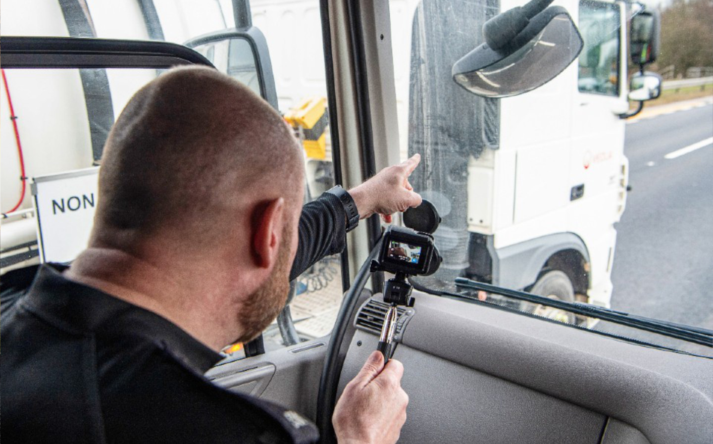 Lorry driver caught eating lasagne with knife and fork on motorway