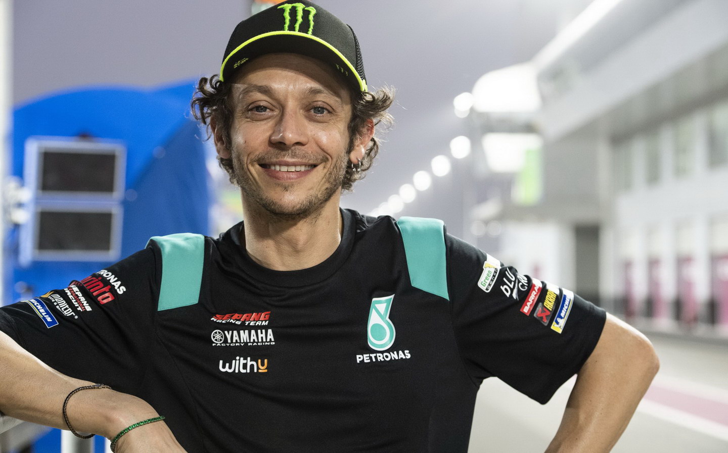 Valentino Rossi will switch to car racing following his retirement from  MotoGP