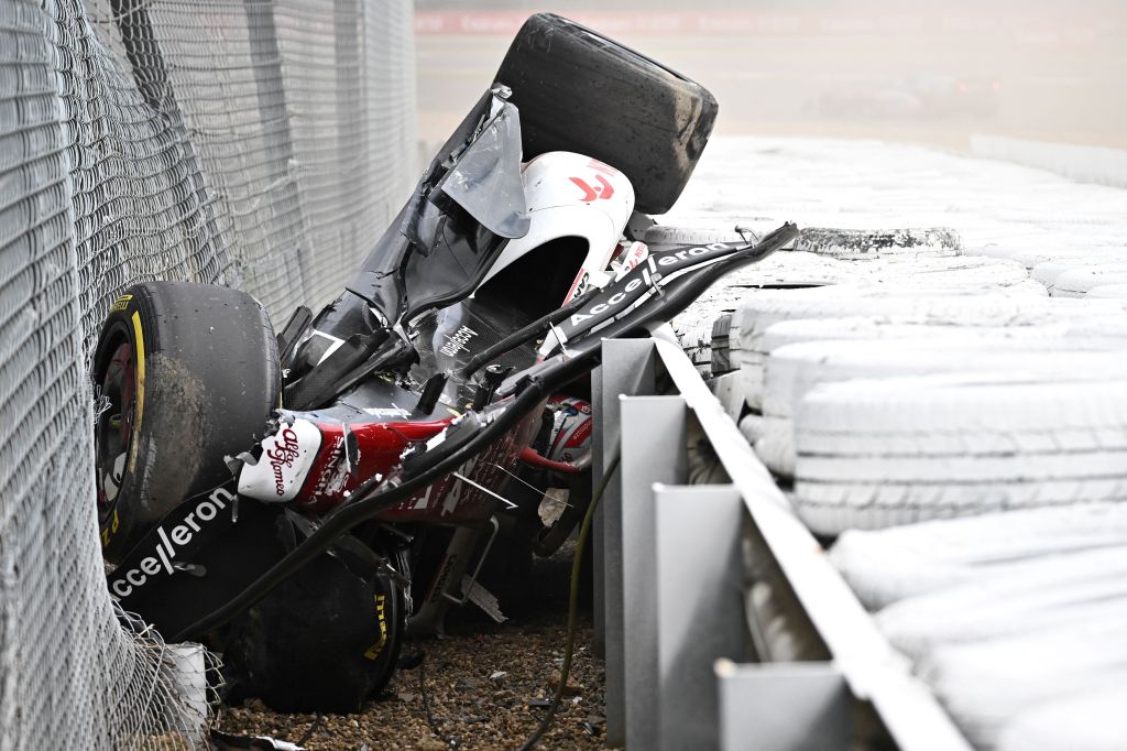 Zhou Guanyu stuck between the tyre barrier and the safety fence at 2022 British GP