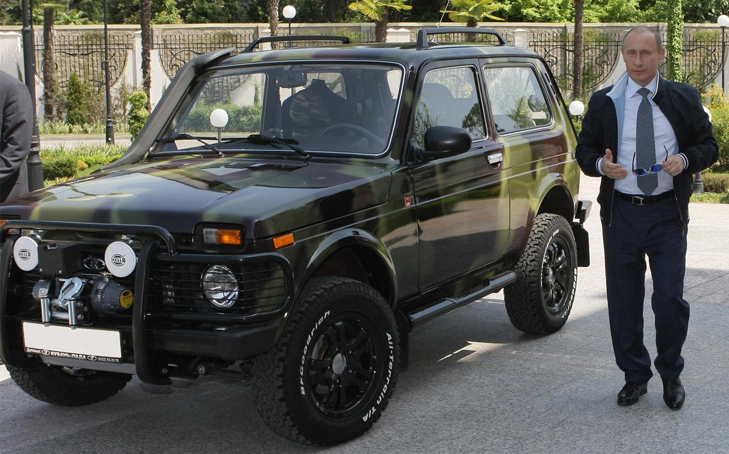 Russian President Vladimir Putin with his camouflaged Lada Niva 4x4.