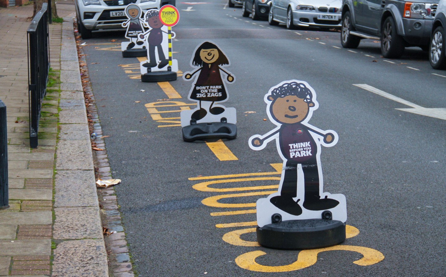 Is it illegal to park on zig-zag lines outside schools?