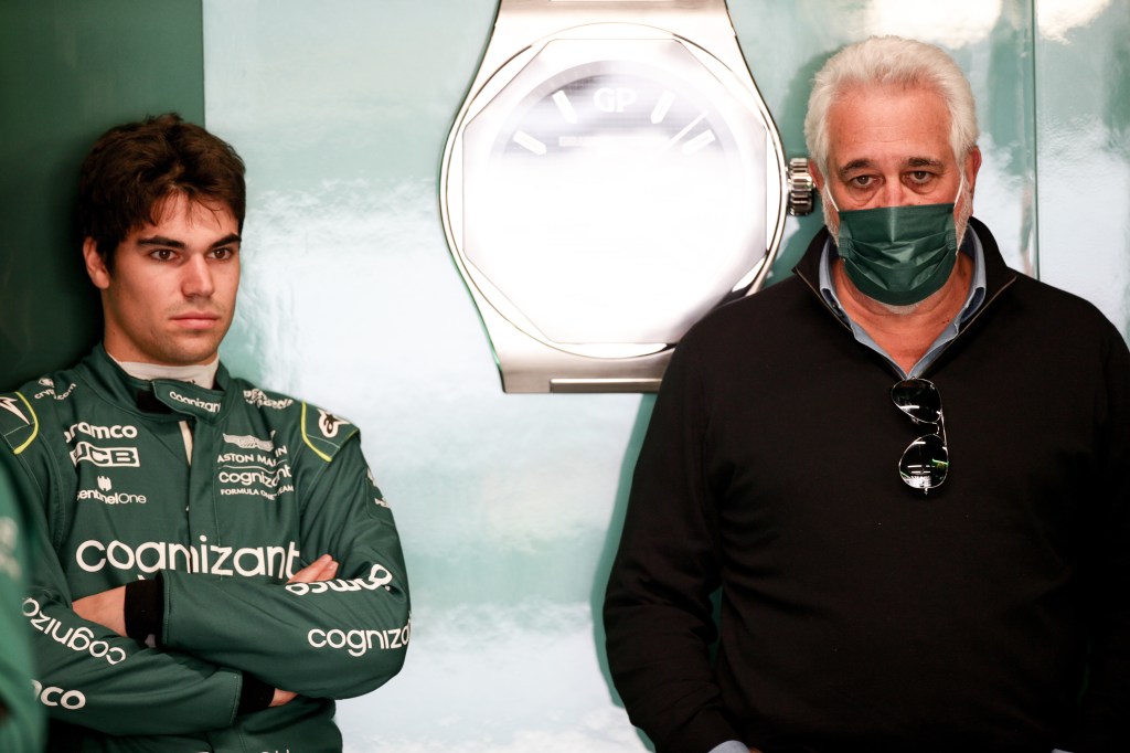Lance Stroll with his father Lawrence Stroll, owner of the Aston Martin F1 Team, during day one of F1 testing at Circuit de Catalunya (Peter J Fox/ Getty Images)