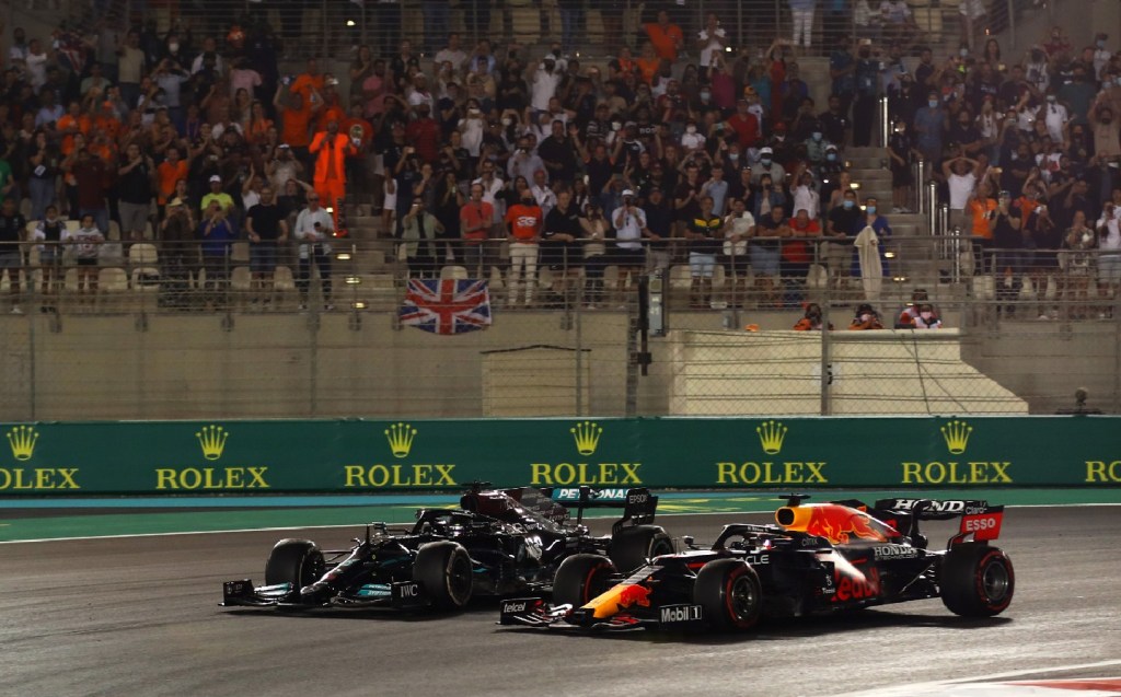 Max Verstappen overtakes Lewis Hamilton to win the 2021 F1 Driver's Championship at Abu Dhabi.