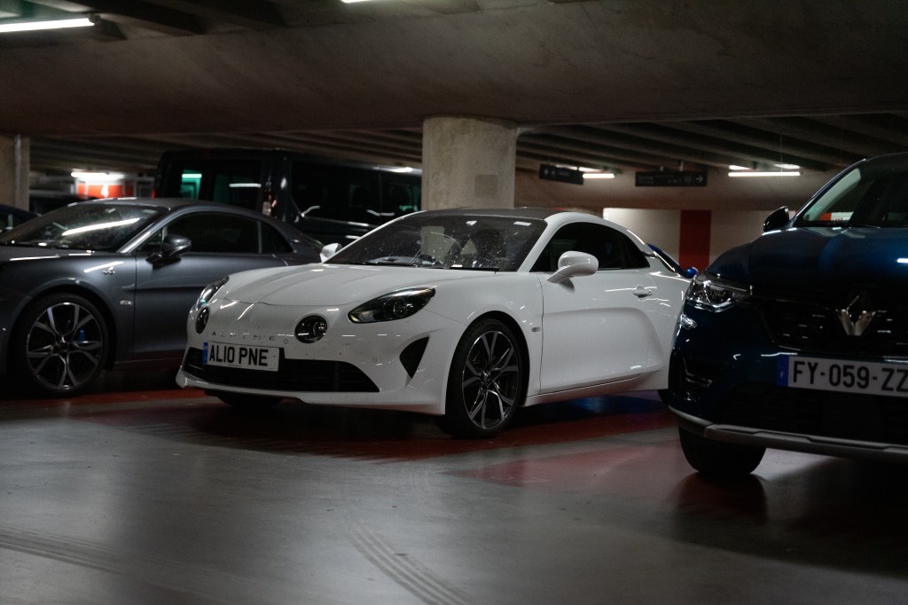 Alpine A110 in car park