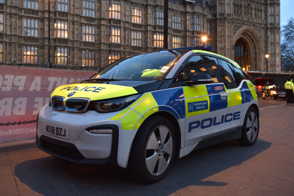 A BMW i3 electric Metropolitan Police car outside the Houses of Parliament on March 14, 2019 in London