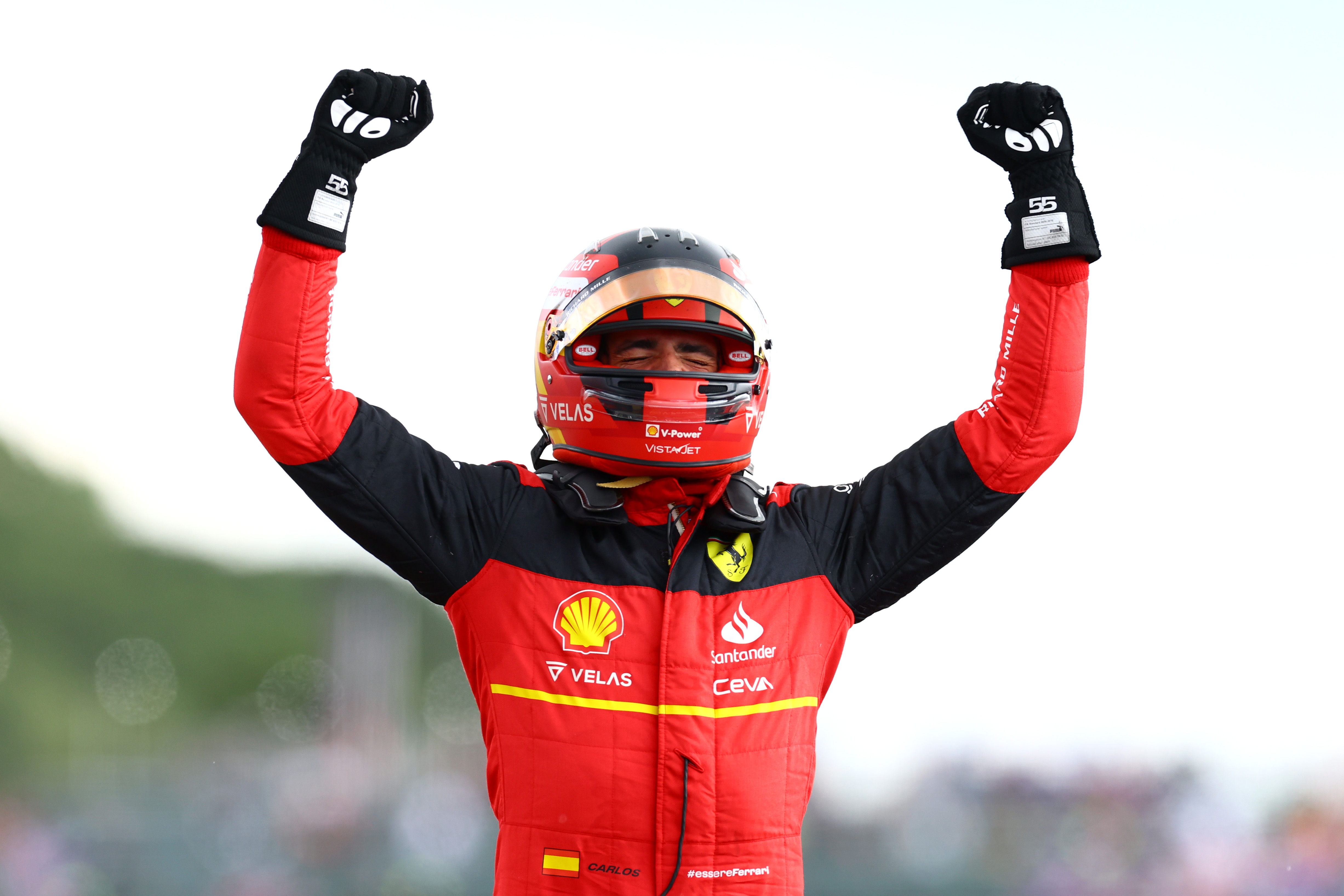 Carlos Sainz celebrates after winning the 2022 British GP