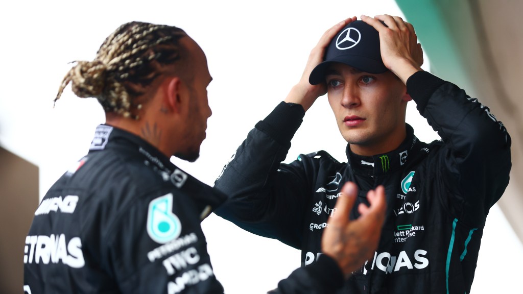 Lewis Hamilton and George Russell chat after the end of the 2022 Hungarian GP