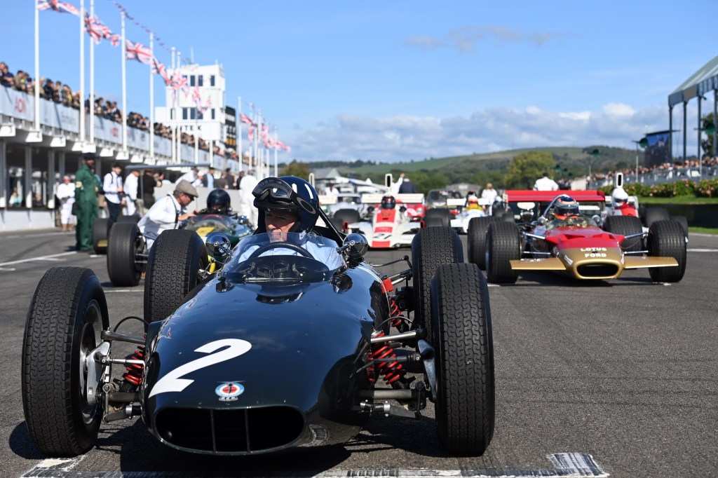 Damon Hill leads a parade of his father Graham's racing cars at the 2022 Goodwood Revival. Photo: John Nguyen/ PA Wire