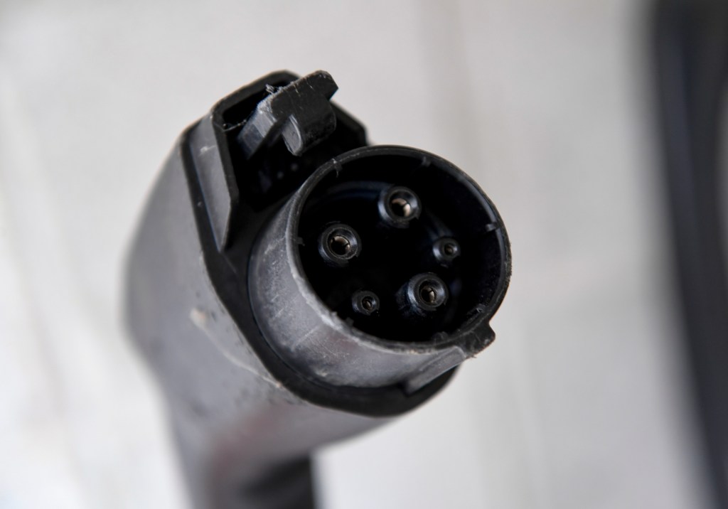 Reading, PA - July 21: The plug for charging an electric vehicle at an EnviroSpark electric vehicle (EV) charging station in the parking garage at the DoubleTree by Hilton Hotel in Reading, PA Wednesday morning July 21, 2021. (Photo by Ben Hasty/MediaNews Group/Reading Eagle via Getty Images)