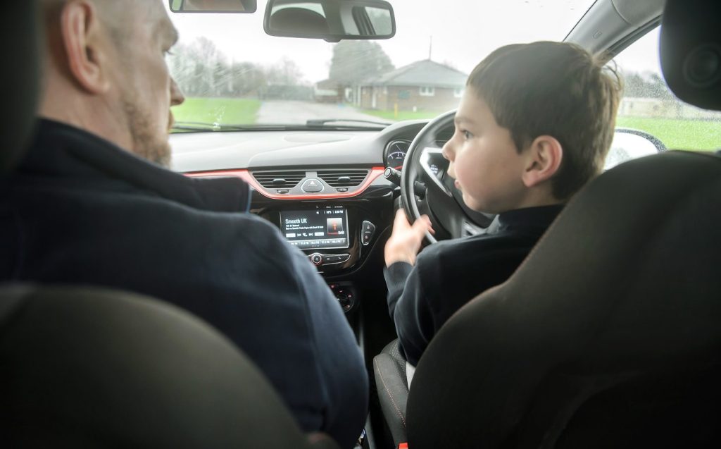 Tong Hudgell with his Young Driver instructor