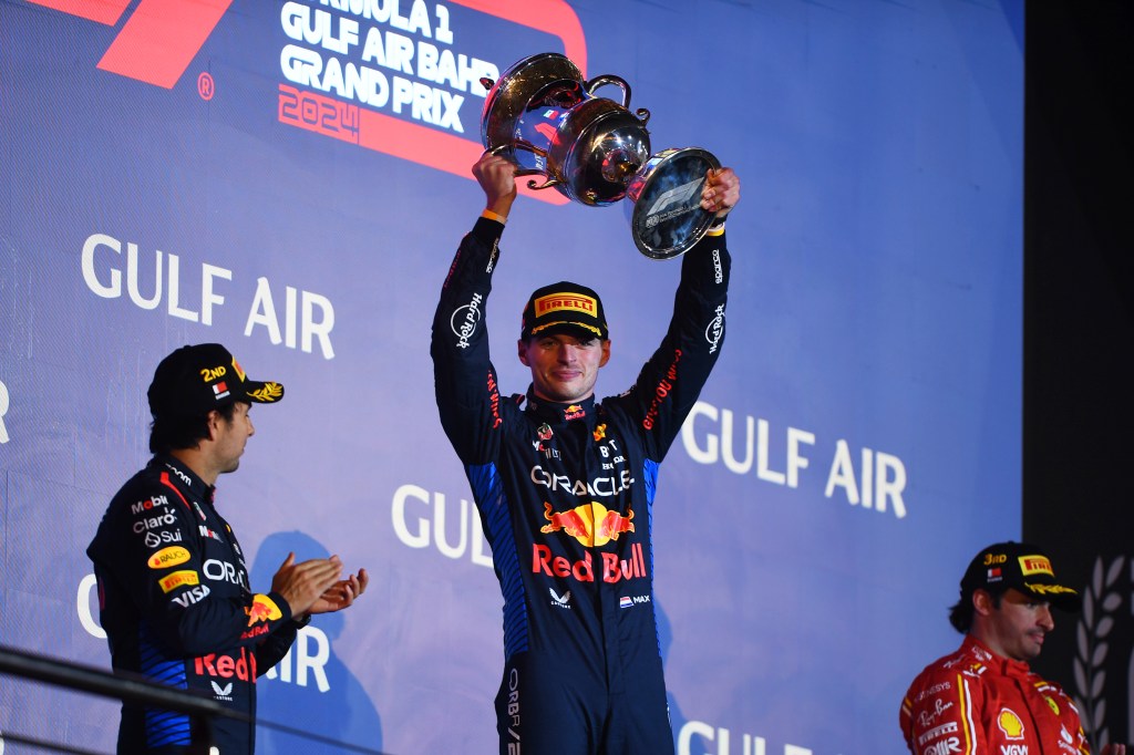 BAHRAIN, BAHRAIN - MARCH 02: Race winner Max Verstappen of the Netherlands and Oracle Red Bull Racing celebrates on the podium during the F1 Grand Prix of Bahrain at Bahrain International Circuit on March 02, 2024 in Bahrain, Bahrain. (Photo by Rudy Carezzevoli/Getty Images)