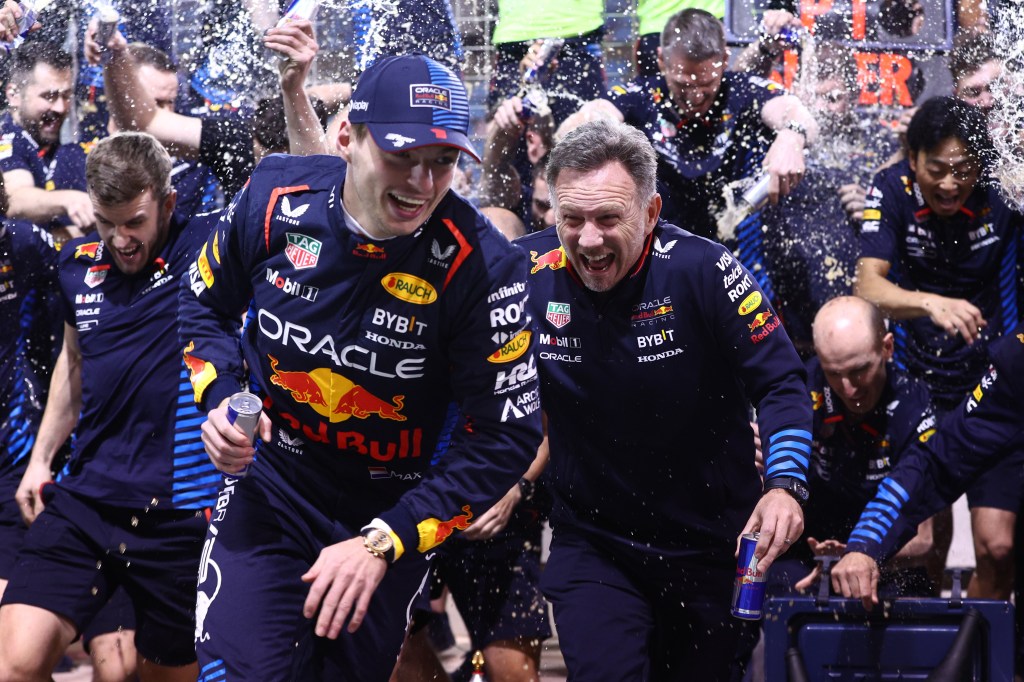 BAHRAIN, BAHRAIN - MARCH 02: Race winner Max Verstappen of the Netherlands and Oracle Red Bull Racing and Oracle Red Bull Racing Team Principal Christian Horner celebrate with the Oracle Red Bull Racing team after the F1 Grand Prix of Bahrain at Bahrain International Circuit on March 02, 2024 in Bahrain, Bahrain. (Photo by Clive Rose/Getty Images)