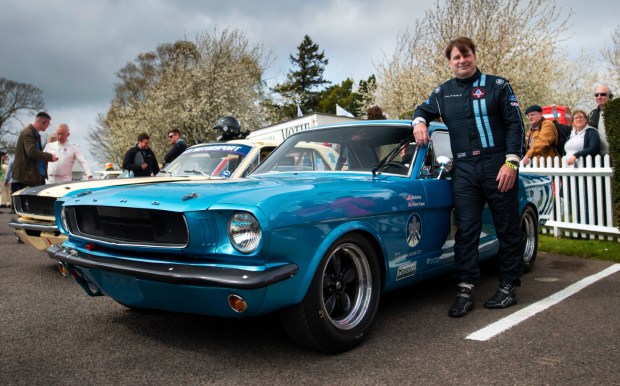 Jim Farley poses with the Alan Mann Racing Ford Mustang at Goodwood Members Meeting 2024