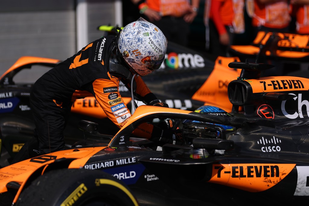 BUDAPEST, HUNGARY - JULY 21: Race winner Oscar Piastri of Australia and McLaren and Second placed Lando Norris of Great Britain and McLaren celebrate in parc ferme during the F1 Grand Prix of Hungary at Hungaroring on July 21, 2024 in Budapest, Hungary. (Photo by Dean Mouhtaropoulos/Getty Images)