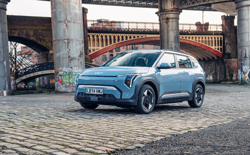 Kia EV3 Air in blue parked under bridge