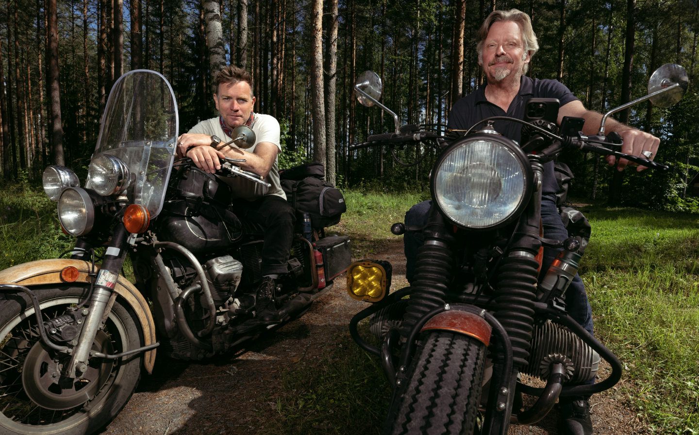Ewan McGregor and Charley Boorman pose on their motorcycles to promote new Long Way Home TV show